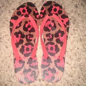 Orange and black coach sandals